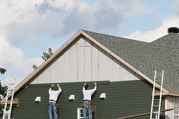 Professional Siding technician working in Keswick, VA